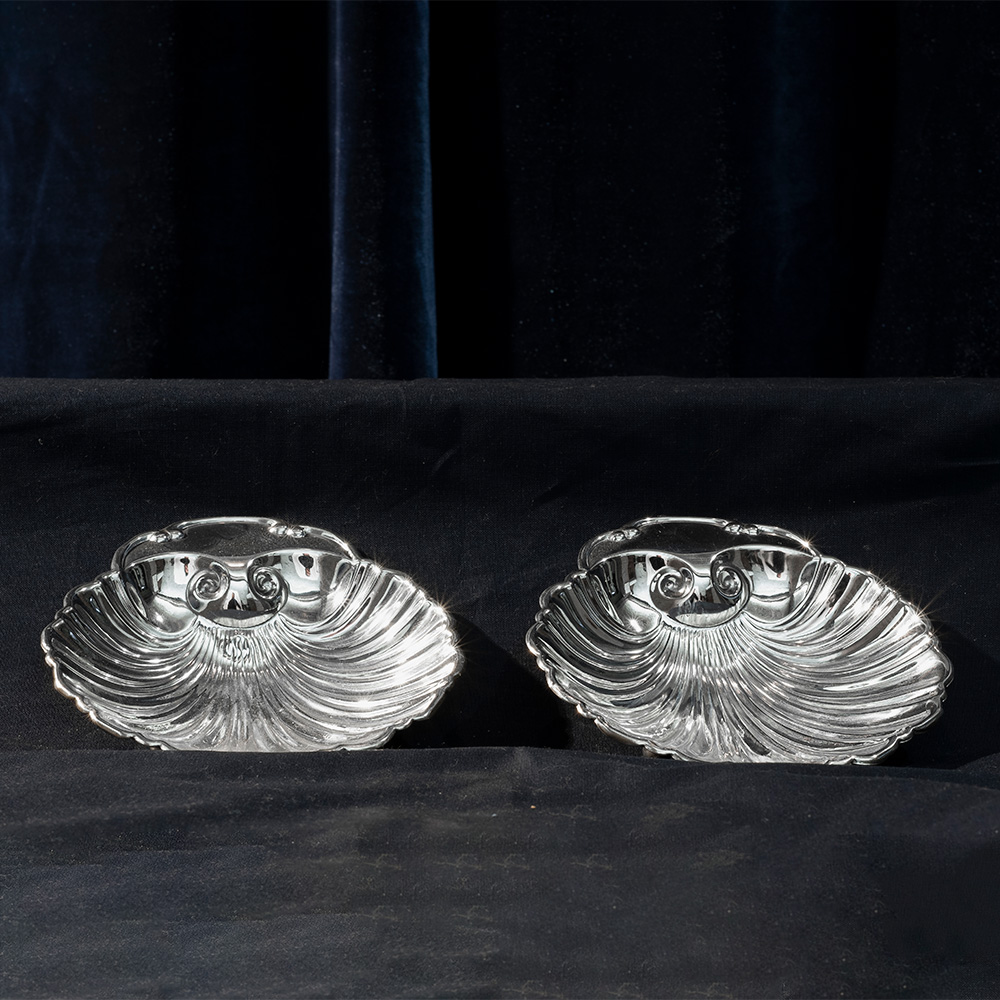 Two Shell shaped silver bowls