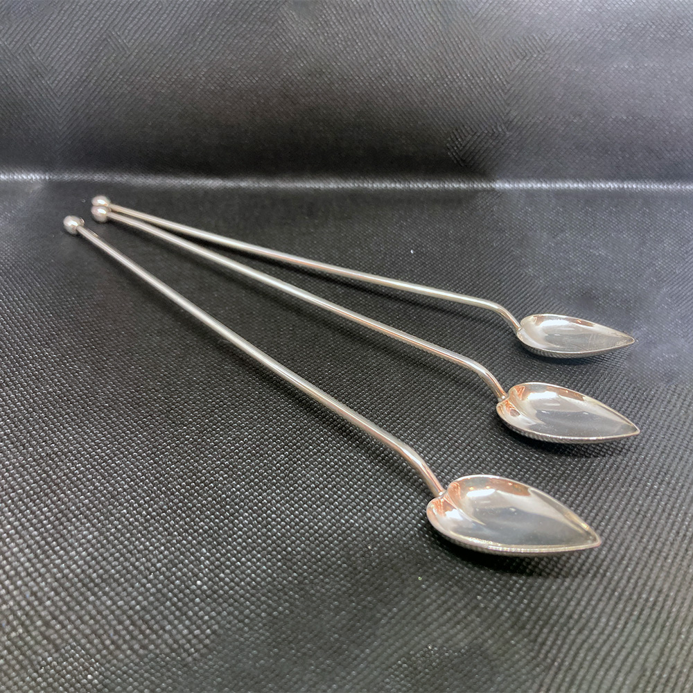 Cucchiaini da bibita con cannuccia forata